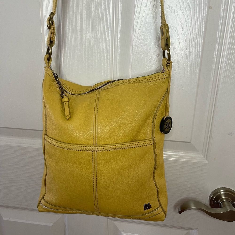 The Sak Pebble Leather Yellow Medium Crossbody Bag..
